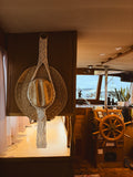 Outback hat and weaved wall mount.