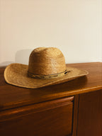 Outback hat and weaved wall mount.
