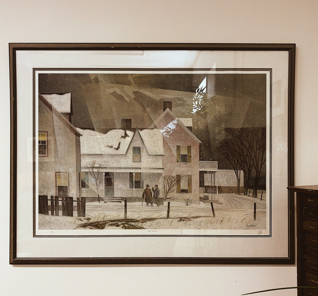 Snow Flurries by A.J. Casson — framed limited edition print 596/700, hung on wall