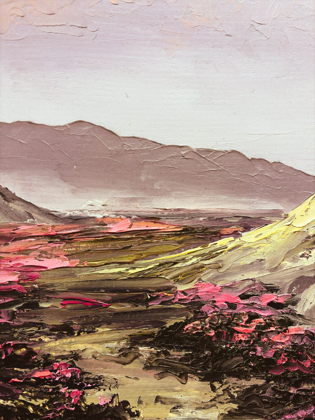 Detail of impasto palette knife work — magenta blooms and mountain landscape